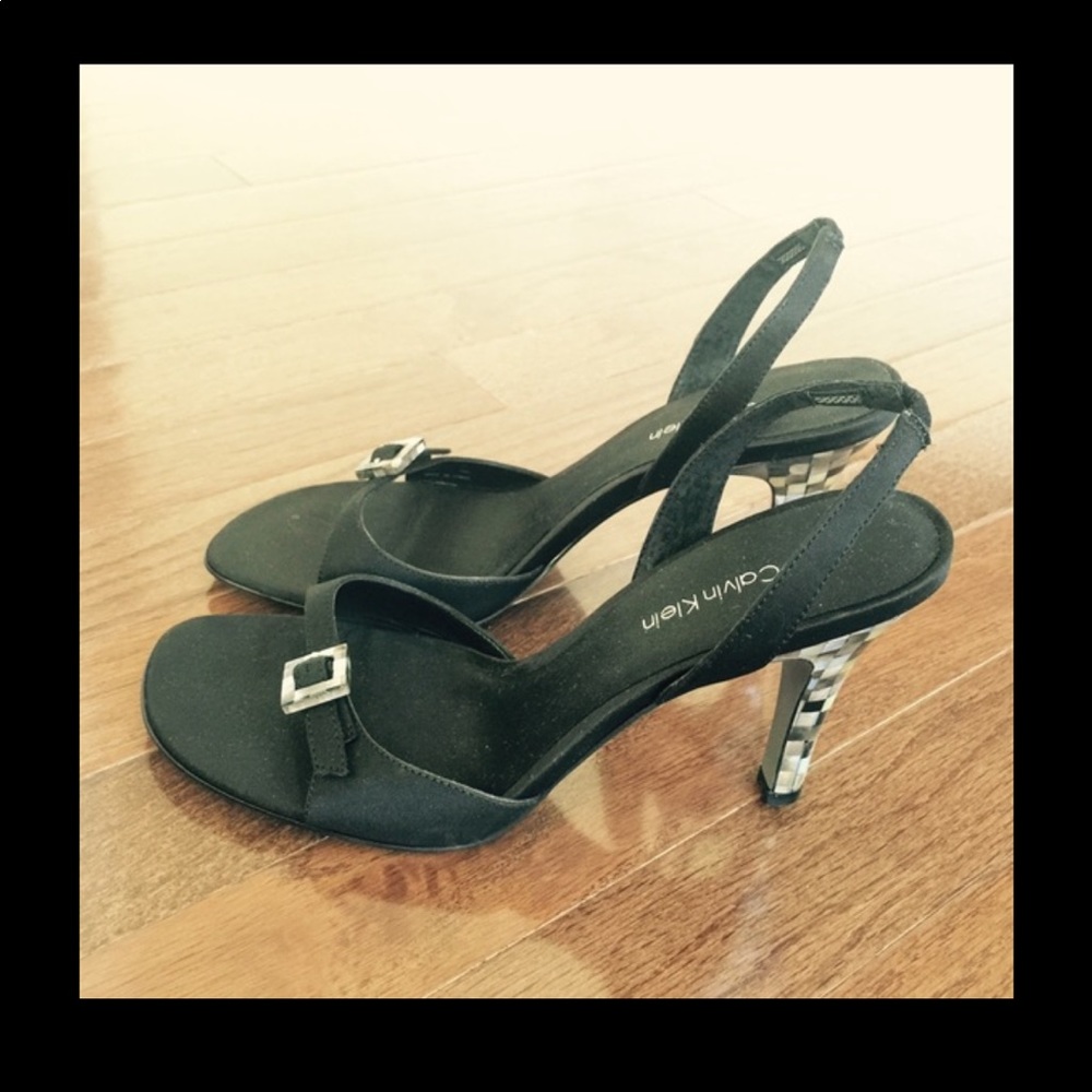 Calvin Klein open-toe w/seashell pattern heels.